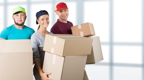 Packed moving boxes prepared for a Kennington home move
