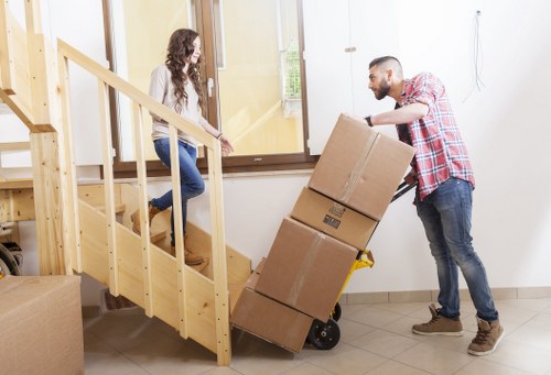 Packed boxes and wrapped furniture ready for a Kennington flat move